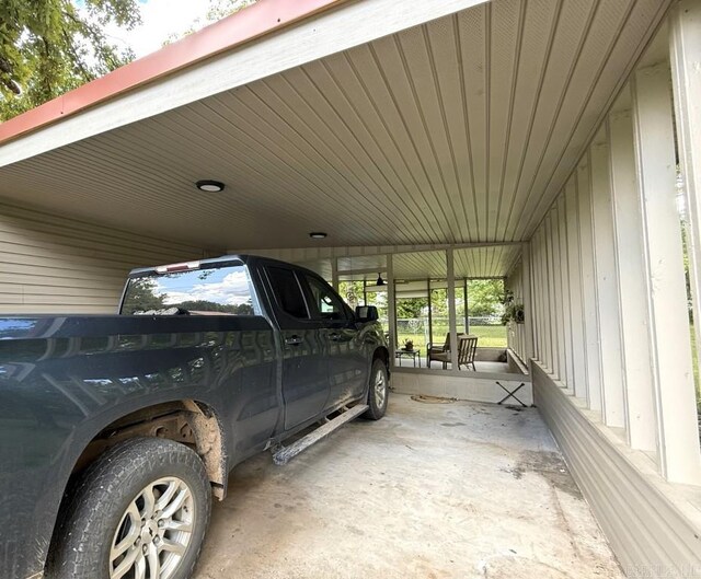 601 Clarence St, Mountain View, AR 72560 - view of parking / parking lot featuring a carport