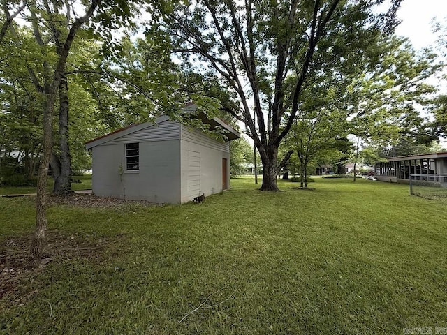 601 Clarence St, Mountain View, AR 72560 - view of green lawn featuring an outdoor structure