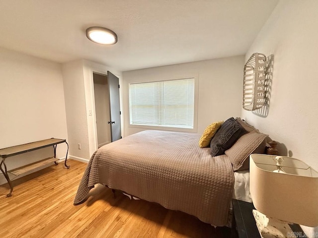 601 Clarence St, Mountain View, AR 72560 - bedroom featuring light wood-style floors and baseboards