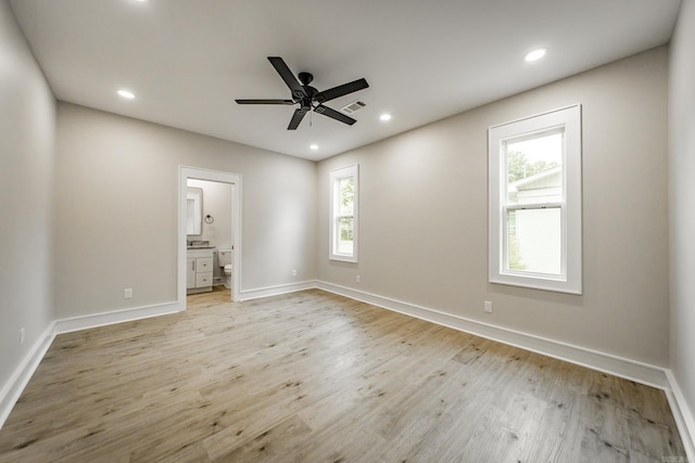 912 Lakeshore Dr, Heber Springs, AR 72543 - unfurnished bedroom featuring baseboards, light wood-type flooring, ensuite bath, recessed lighting, and ceiling fan