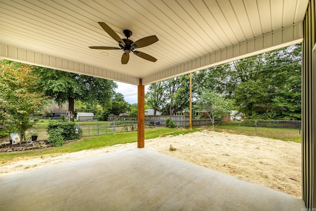 912 Lakeshore Dr, Heber Springs, AR 72543 - view of patio featuring ceiling fan, a fenced backyard, and view of wooded area