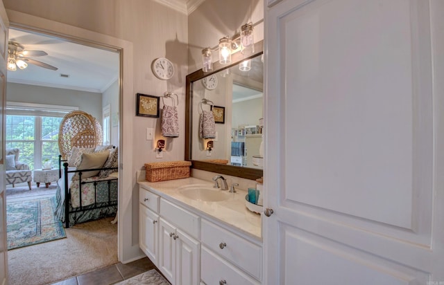 12420 Brodie Creek Trl, Little Rock, AR 72211 - bathroom featuring ornamental molding, vanity, a ceiling fan, and tile patterned floors