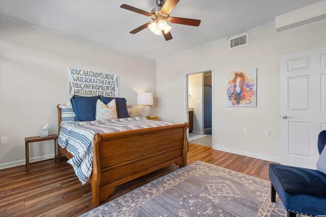 bedroom with crown molding, baseboards, wood finished floors, a ceiling fan, and connected bathroom