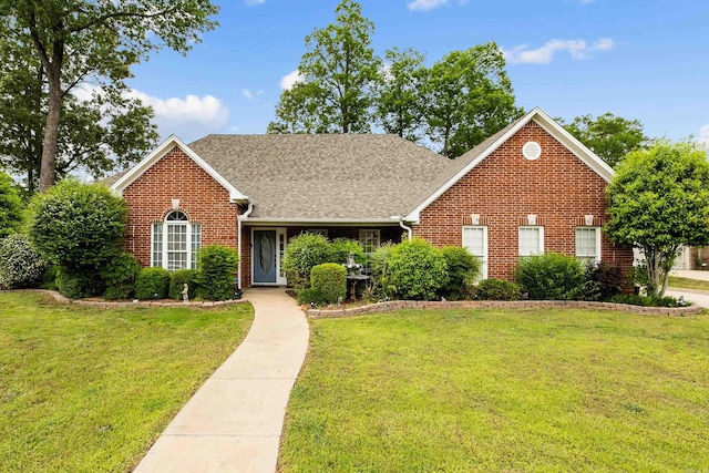2724 Crooked Stick Dr, Benton, AR 72015 - traditional home featuring brick siding, a front lawn, and a shingled roof
