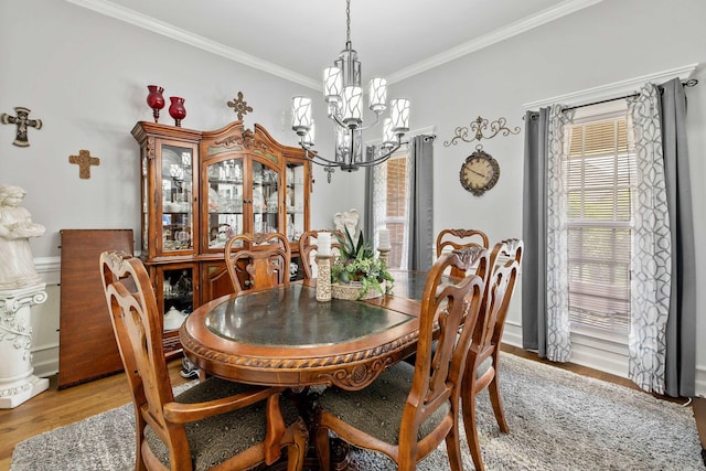 2724 Crooked Stick Dr, Benton, AR 72015 - dining room with a chandelier, crown molding, and light wood-style flooring