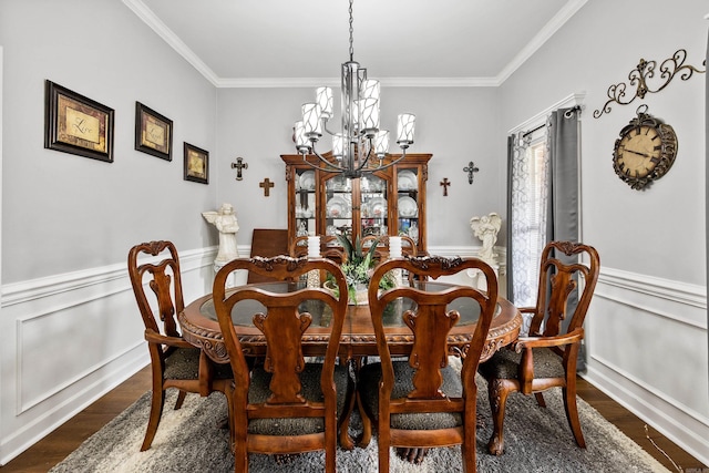 2724 Crooked Stick Dr, Benton, AR 72015 - dining area with a chandelier, crown molding, dark wood finished floors, and wainscoting