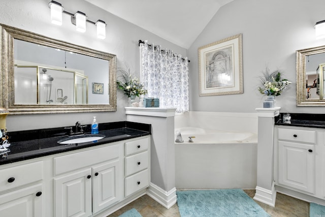 2724 Crooked Stick Dr, Benton, AR 72015 - full bath with a stall shower, lofted ceiling, vanity, a bath, and tile patterned floors