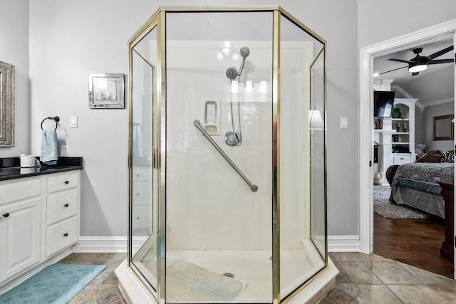 2724 Crooked Stick Dr, Benton, AR 72015 - bathroom with ensuite bathroom, a ceiling fan, a stall shower, and baseboards