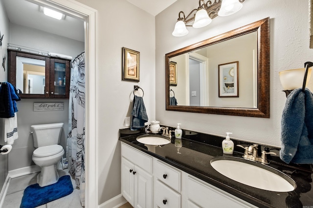 2724 Crooked Stick Dr, Benton, AR 72015 - full bath featuring toilet, double vanity, and baseboards
