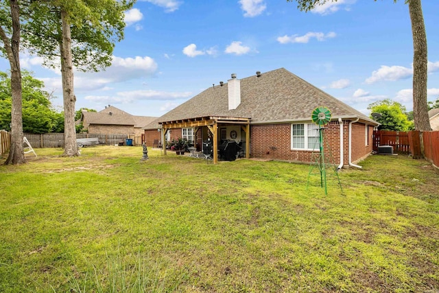 2724 Crooked Stick Dr, Benton, AR 72015 - back of property with a chimney, brick siding, cooling unit, and a shingled roof
