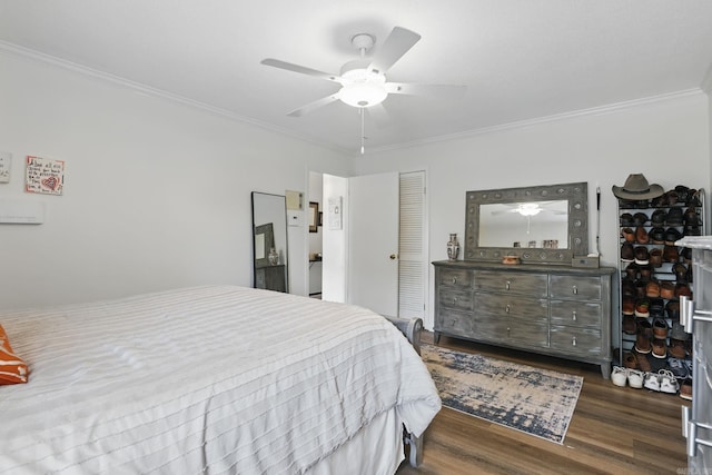 bedroom with ornamental molding, dark wood-style flooring, and ceiling fan