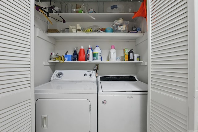 laundry room featuring separate washer and dryer