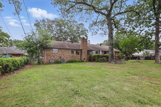 view of yard with central AC