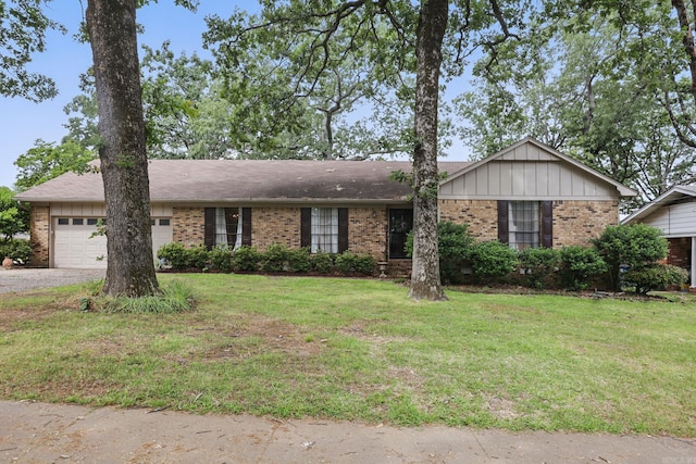 ranch-style house with brick siding, an attached garage, a front lawn, driveway, and board and batten siding