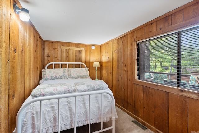 112 Fairchild Pt, Hot Springs, AR 71901 - bedroom featuring wooden walls and carpet
