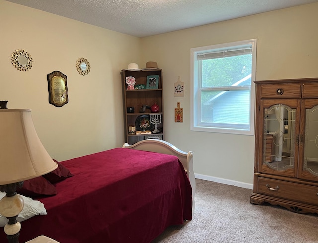 3605 W Overland Cir, Harrison, AR 72601 - carpeted bedroom featuring baseboards and a textured ceiling
