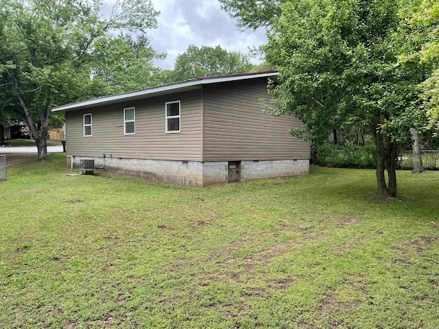 3605 W Overland Cir, Harrison, AR 72601 - view of property exterior featuring crawl space, a yard, and central AC