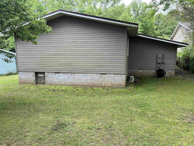 3605 W Overland Cir, Harrison, AR 72601 - view of property exterior with crawl space and a lawn
