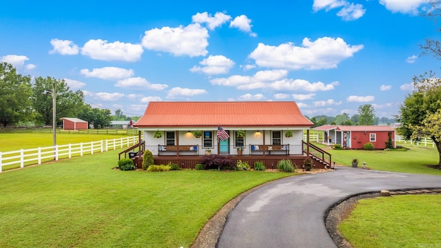 271 Austin Loop, El Paso, AR 72045 - view of front of property featuring covered porch, stucco siding, metal roof, and asphalt driveway