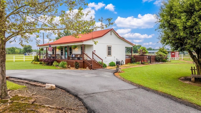 271 Austin Loop, El Paso, AR 72045 - view of front of property featuring covered porch and metal roof
