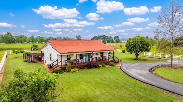 271 Austin Loop, El Paso, AR 72045 - rear view of property featuring a porch, a view of countryside, and metal roof