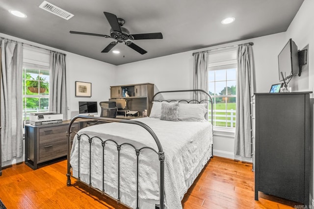 271 Austin Loop, El Paso, AR 72045 - bedroom featuring light wood-type flooring, multiple windows, recessed lighting, and a ceiling fan