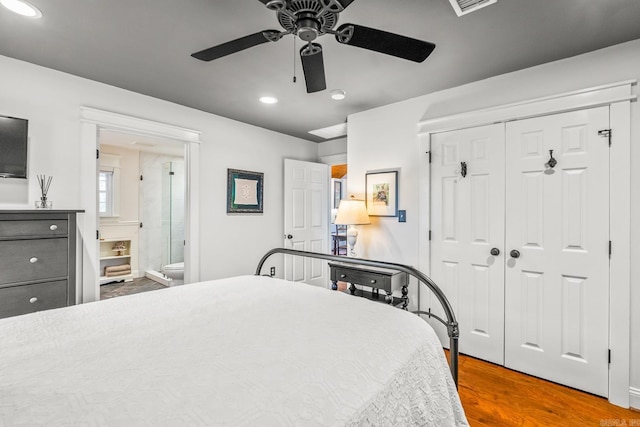 271 Austin Loop, El Paso, AR 72045 - bedroom with wood finished floors, recessed lighting, a closet, ensuite bathroom, and a ceiling fan