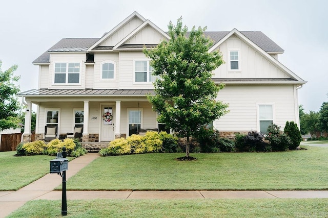 1600 Winterbrook Dr, Conway, AR 72034 - craftsman inspired home with board and batten siding, a standing seam roof, a porch, a front yard, and metal roof