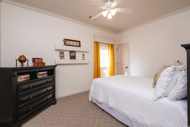 bedroom featuring ornamental molding, light colored carpet, baseboards, and ceiling fan