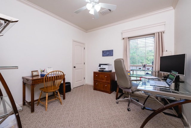 home office with ornamental molding, a ceiling fan, light carpet, and baseboards