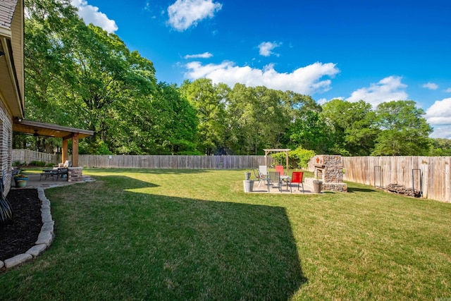 view of yard with a patio area