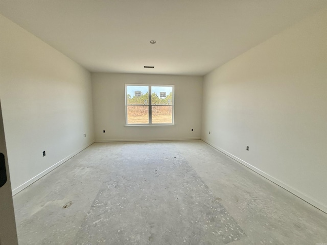 238 Kelton St, Hensley, AR 72065 - spare room featuring concrete floors and baseboards