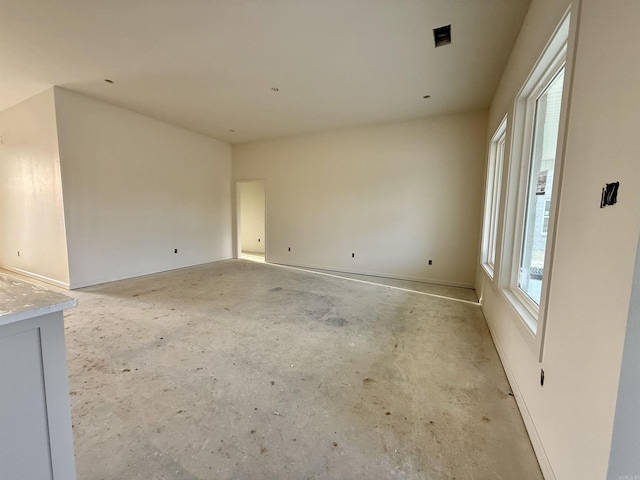 238 Kelton St, Hensley, AR 72065 - unfurnished room featuring concrete flooring and baseboards