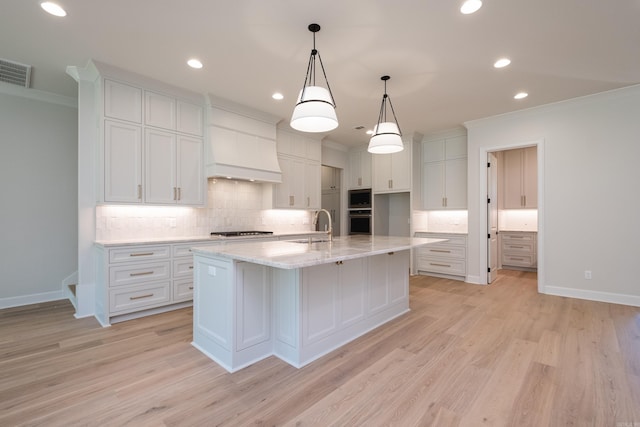 20 Abington Ct, Little Rock, AR 72223 - kitchen with appliances with stainless steel finishes, a sink, crown molding, tasteful backsplash, and white cabinetry