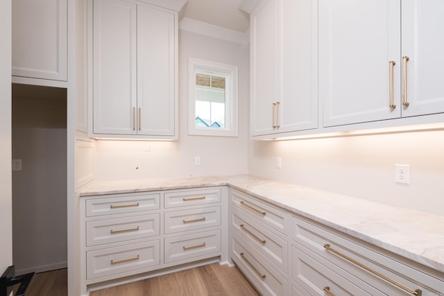 20 Abington Ct, Little Rock, AR 72223 - kitchen featuring white cabinetry, light stone counters, and light wood finished floors