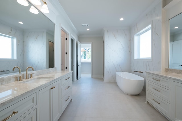 20 Abington Ct, Little Rock, AR 72223 - full bathroom featuring plenty of natural light, vanity, a soaking tub, crown molding, and recessed lighting