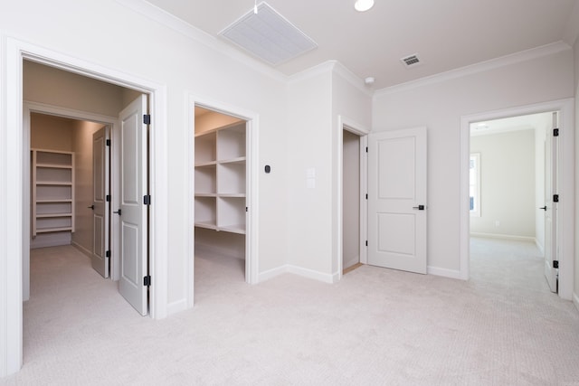 20 Abington Ct, Little Rock, AR 72223 - unfurnished bedroom featuring a walk in closet, light carpet, crown molding, and a closet