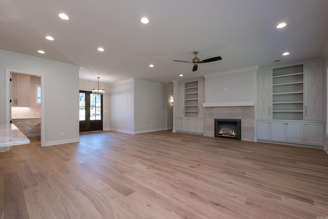 20 Abington Ct, Little Rock, AR 72223 - unfurnished living room featuring crown molding, a ceiling fan, baseboards, recessed lighting, and a tiled fireplace