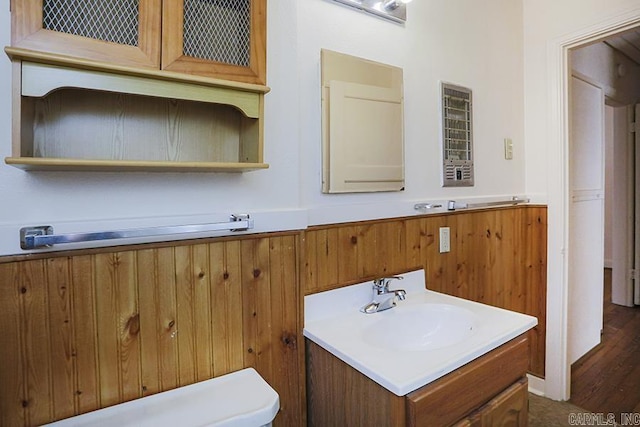 bathroom with vanity and wainscoting