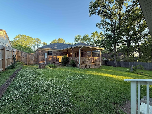 view of yard featuring a porch
