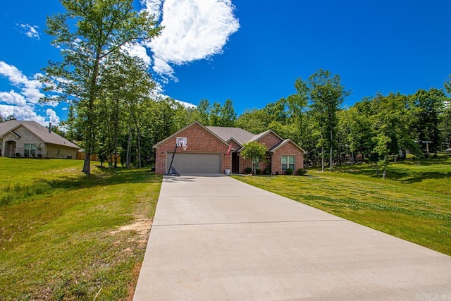view of front of house featuring an attached garage, a front lawn, driveway, and brick siding