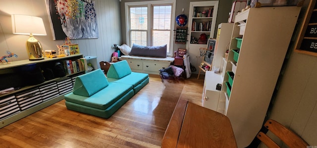 rec room featuring wood finished floors