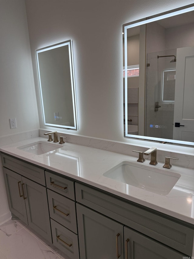 1015 N Shackleford Rd, Little Rock, AR 72211 - bathroom featuring a shower stall, double vanity, and marble look tiles