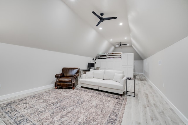 living area featuring a ceiling fan, light wood finished floors, lofted ceiling, baseboards, and recessed lighting