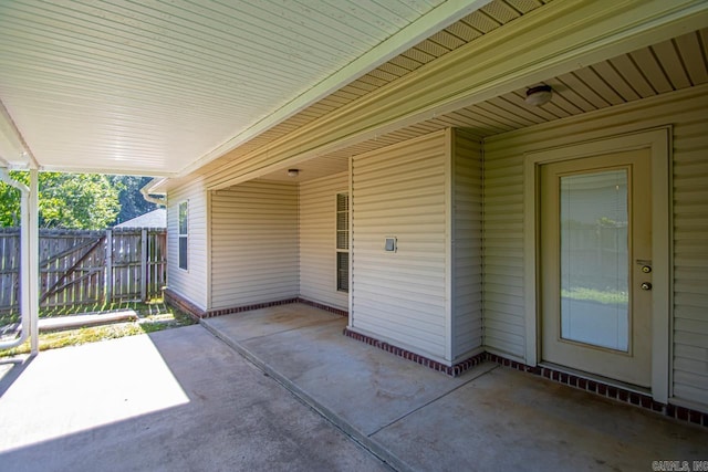 view of patio / terrace featuring fence