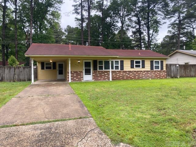 3804 Arapaho Trl, Little Rock, AR 72209 - ranch-style house featuring concrete driveway, an attached carport, and brick siding