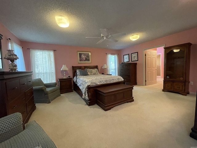 1502 Quail Creek Dr, Conway, AR 72032 - bedroom with a textured ceiling, light carpet, and ceiling fan