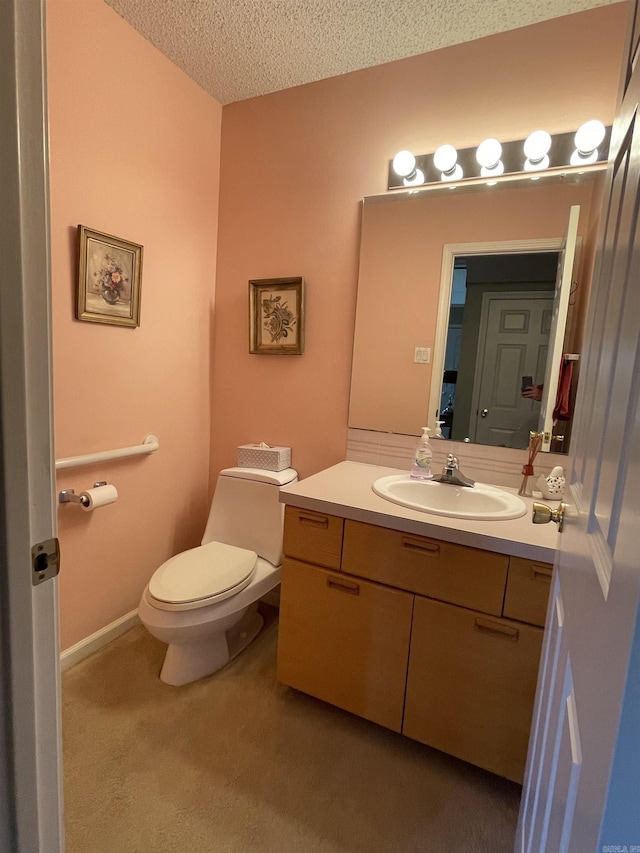 1502 Quail Creek Dr, Conway, AR 72032 - bathroom featuring vanity, a textured ceiling, and toilet