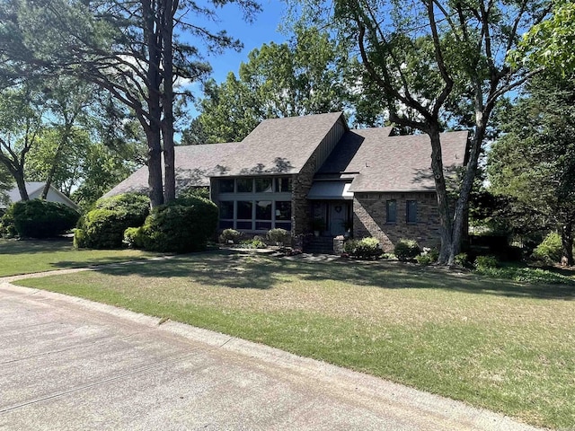 1502 Quail Creek Dr, Conway, AR 72032 - view of front of home with a front yard and roof with shingles