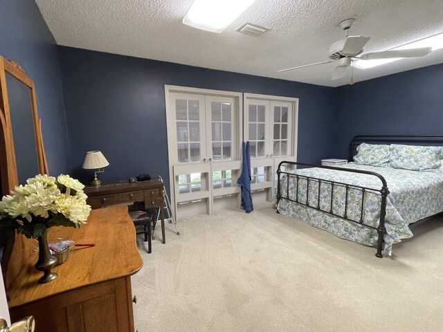 1502 Quail Creek Dr, Conway, AR 72032 - carpeted bedroom featuring a textured ceiling and a ceiling fan